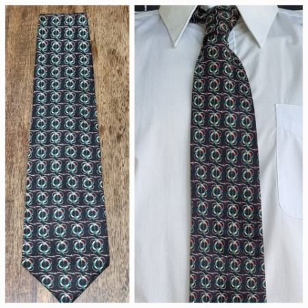 1970's Tie, Black/yellow/red/green/cream print, polyester