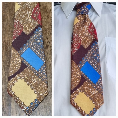 Retro Tie, 1970's, camel/blue/red/brown print, silk, by 'Cama of Italy'